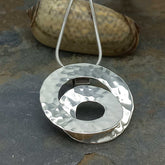 Hammered sterling silver spiral pendant